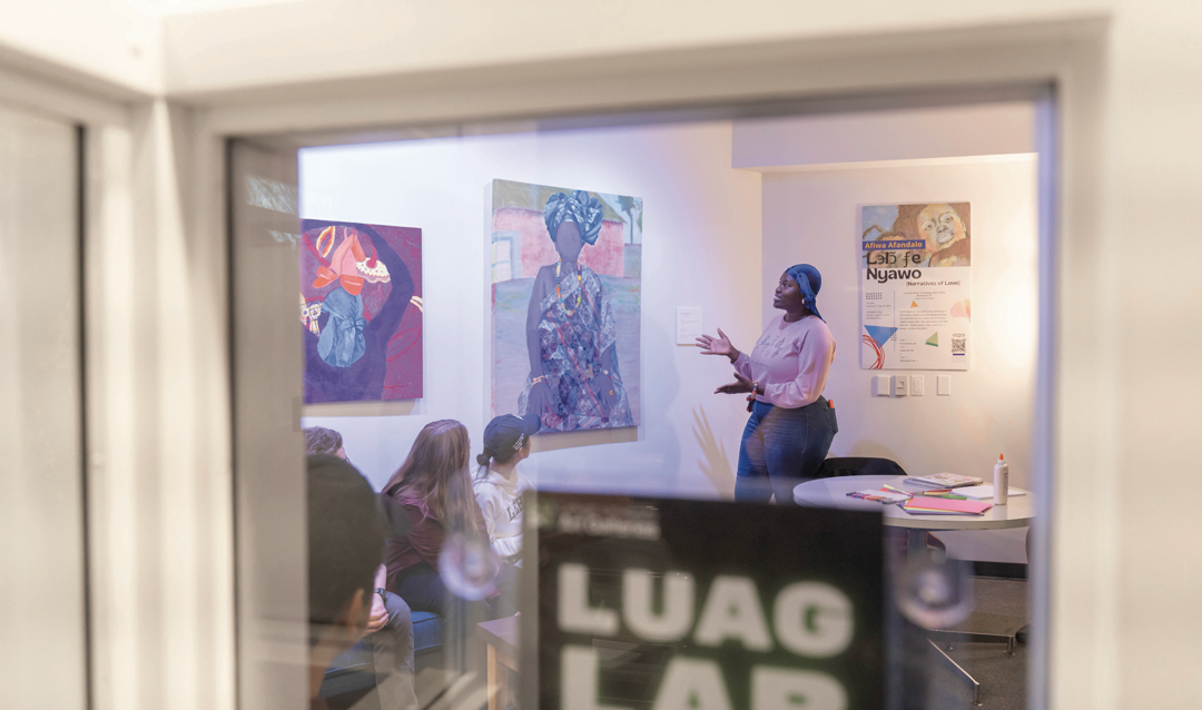 Afiwa Afandalo speaks about her work during the Artist Exhibition Gallery Viewing