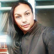 Ariel smizing in front of windows
